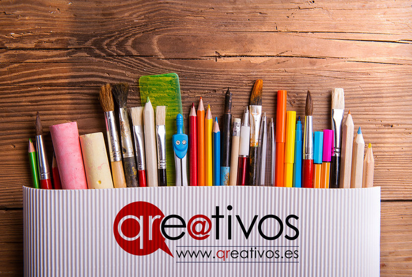 Various school and art supplies laid on table, flat lay. Studio shot on wooden background, copy space