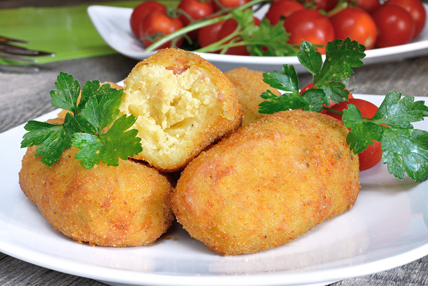 typical neapolitan food  potato croquettes fried made ​​with mozzarella cheese and diced bacon